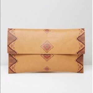 Gracie Roberts Embossed clutch bag